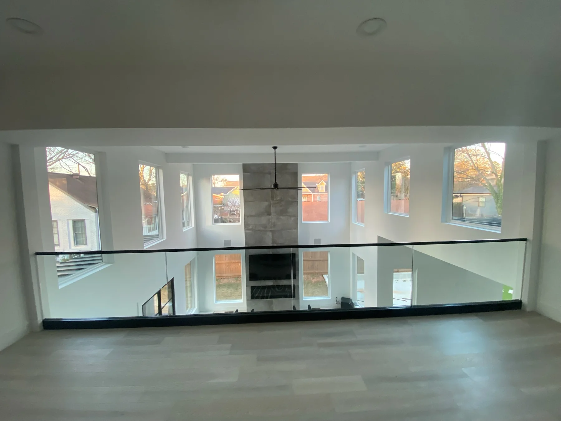 Interior loft with glass railing panels